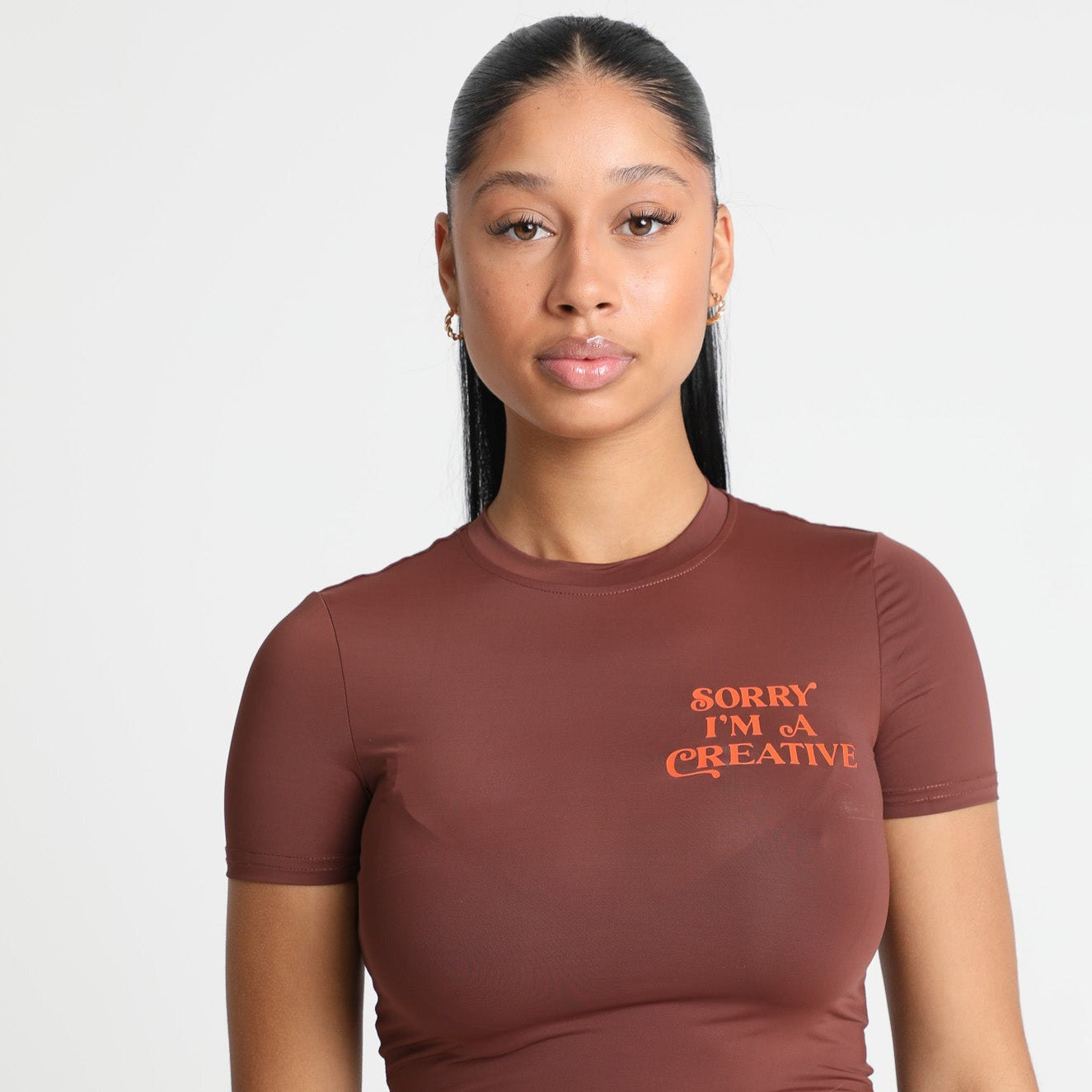 Sorry I'm A Creative - Baby Tee (Brown + Orange)