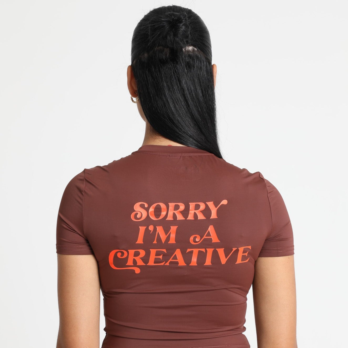 Sorry I'm A Creative - Baby Tee (Brown + Orange)